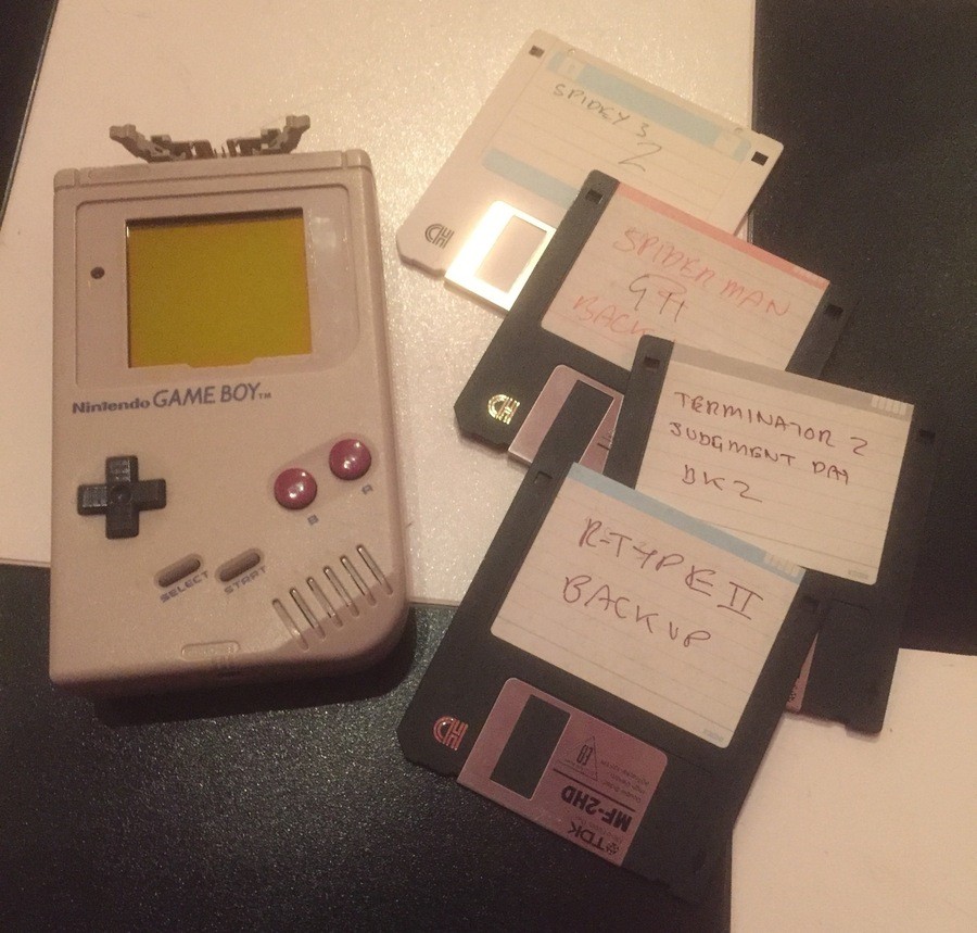 Discs containing code for Bits Studio titles, along with the development Game Boy unit Austin used to create R-Type