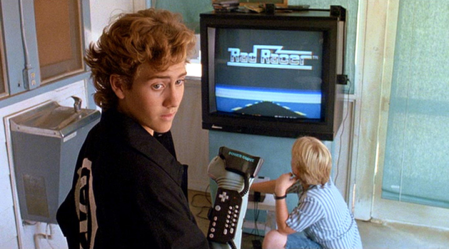 The infamous Power Glove scene – villain of the piece Lucas Barton gives a demo of the controller with Rad Racer