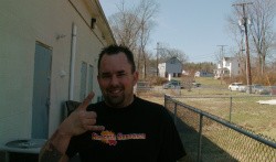 Richie Knucklez throwing up the horns