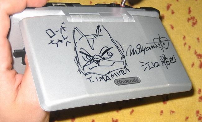 Rhodri's DS console is signed by Miyamoto, Imamura and Eguchi