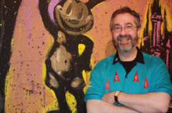 Warren Spector and Oswald in happier times