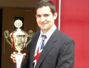 Sami Cetin with his Super Mario Kart World Championship 2012 trophy