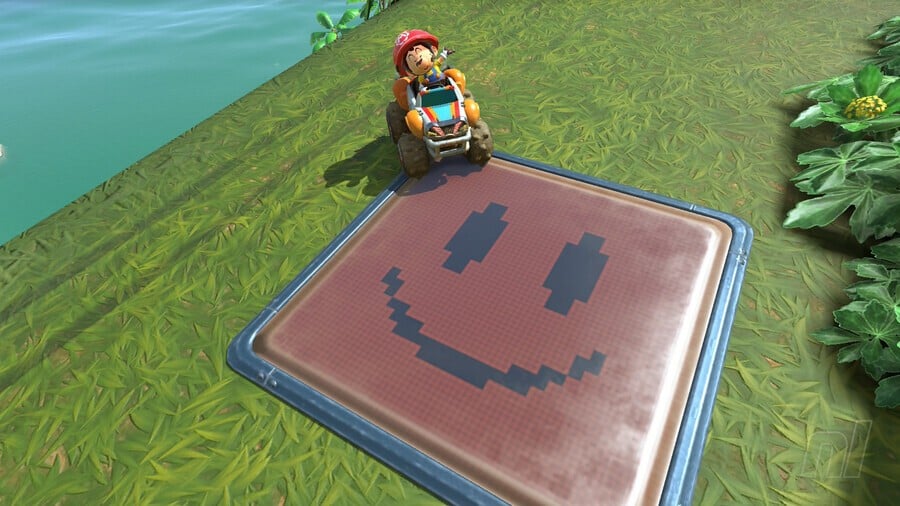 Baby Mario next to a smiling Question Panel, which has been completed, in Mario Kart World