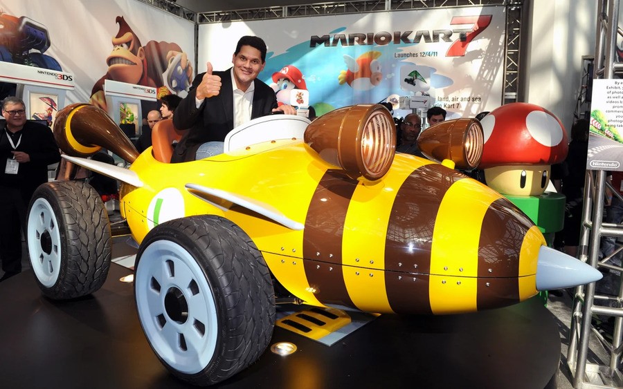 Posing in oversized Mario karts was all the rage for major executives