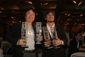 Shigeru Miyamoto and Eiji Aonuma pose with the awards