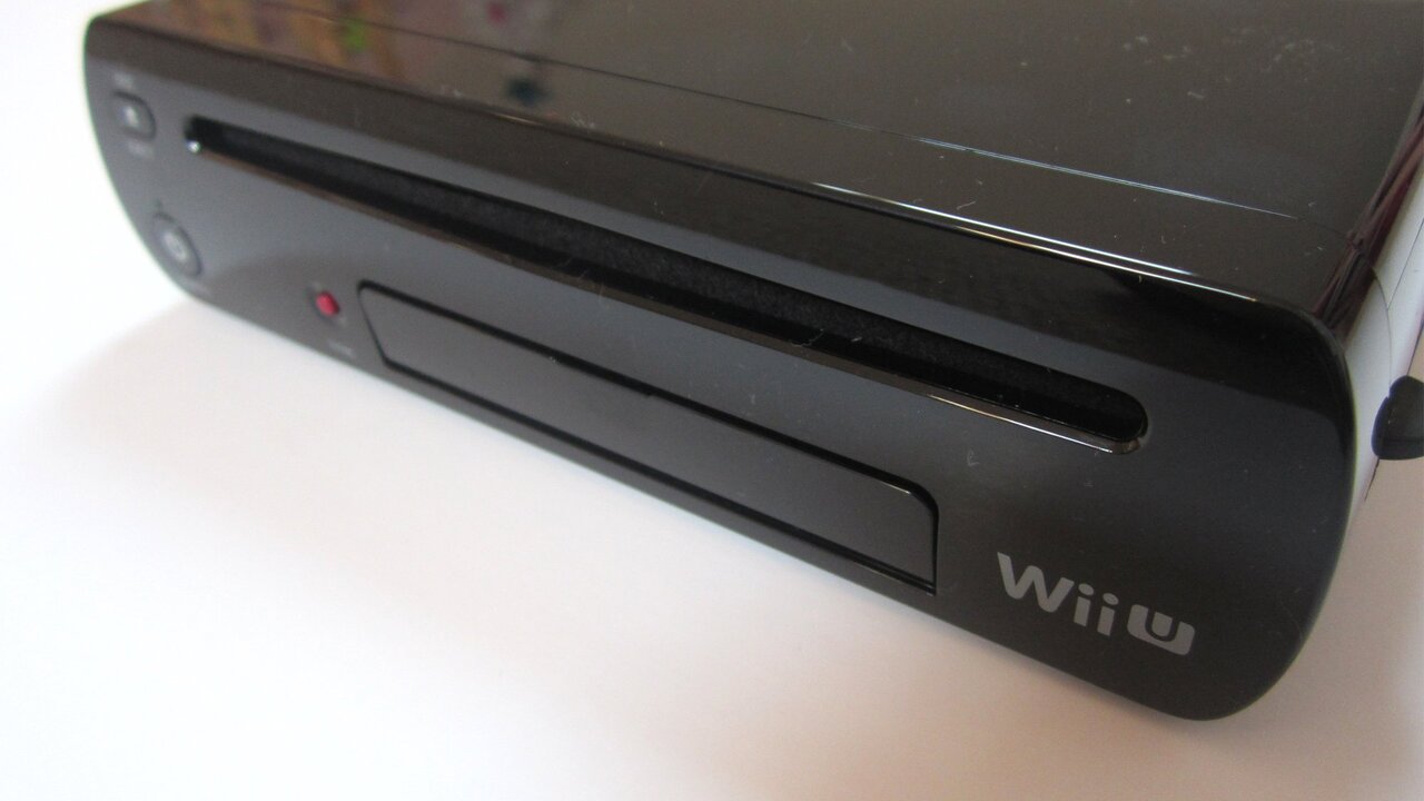 Curious Kid Stuffed Switch Game Cartridges into Wii U Disc Tray