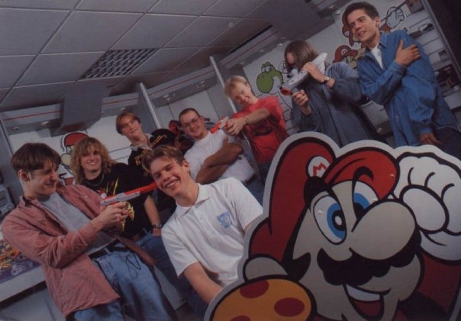 Hotliners plead with the supervisor for a break in 1993. (L-R) Keith Pullin, Shaun White, Marc Titheridge, Ben Gunstone, unknown, unknown, Oli ?, unknown – oh, and Mario.