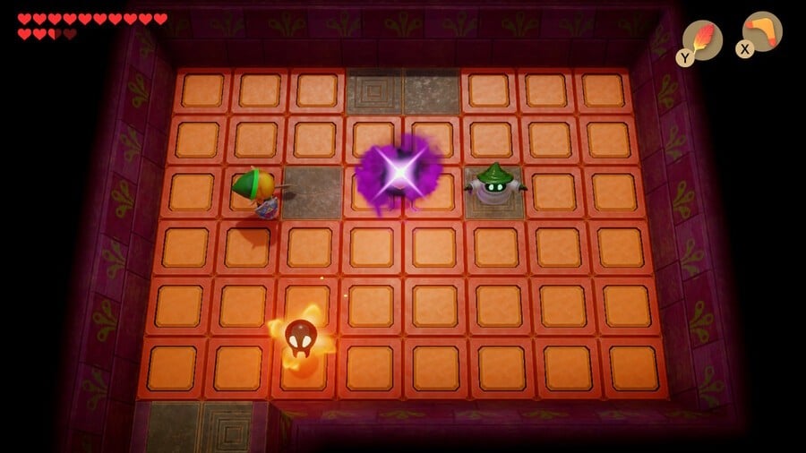 Defeating Wizzrobes in the orange barrier room for a Small Key