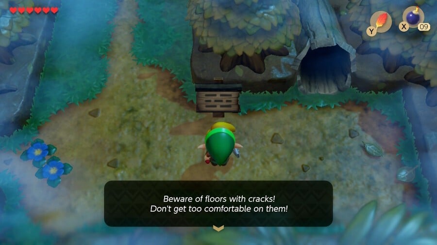 Link reads a sign about crumbling floors