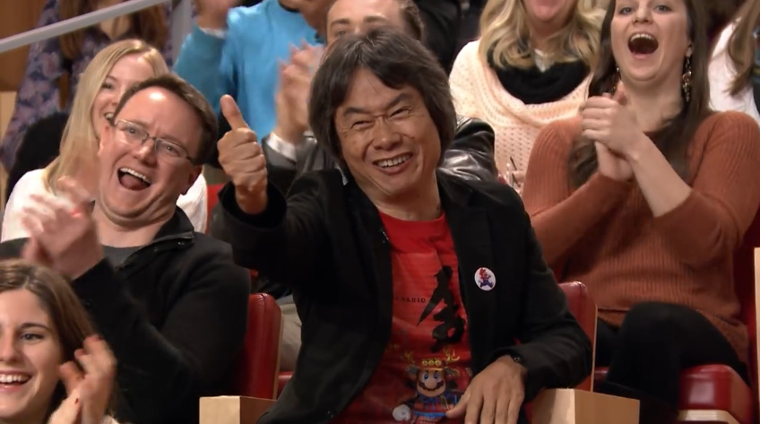Bill Trinen and 'lady in orange' were loving Miyamoto's thumbs up