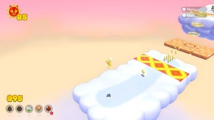 (Clockwise, from top left) Use the bounce pad to reach the smiling cloud. Once you've entered the cloud, you need to defeat all of the enemies to make the Cat Shine appear. Use the gold rings as a guide when it comes to returning to the land below