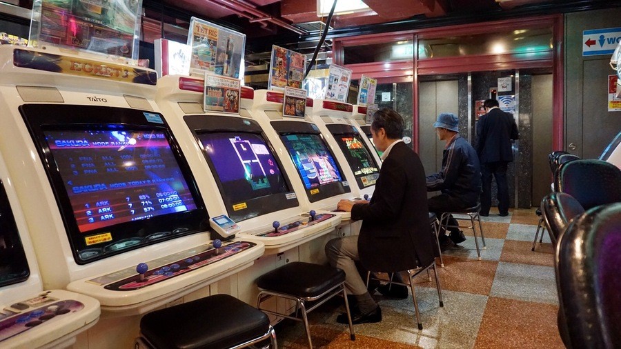 A Puzzle Bobble player spends a public holiday afternoon at a Taito Egret II cabinet in the Taito Station arcade in Shinjuku, Tokyo