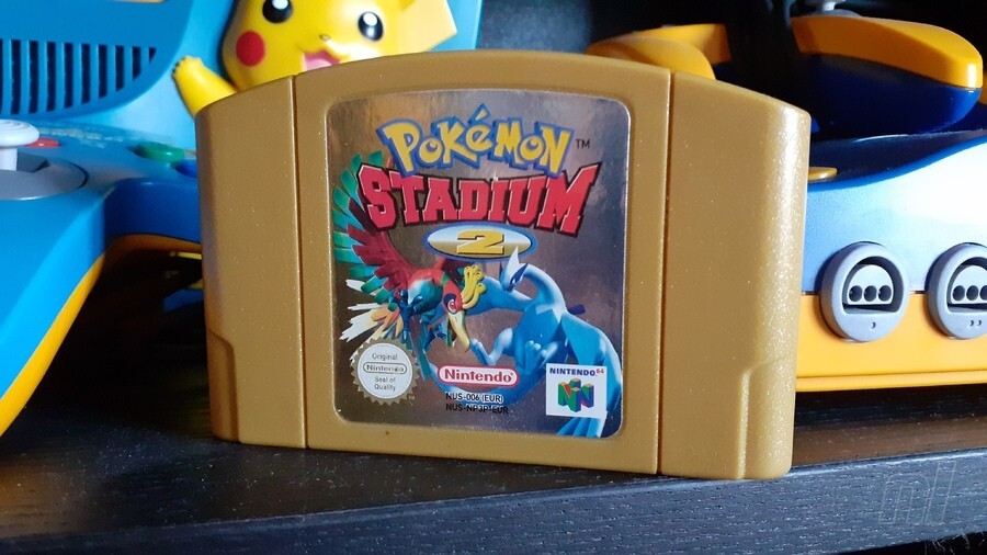 Pokémon Stadium 2's gorgeous golden European N64 cartridge
