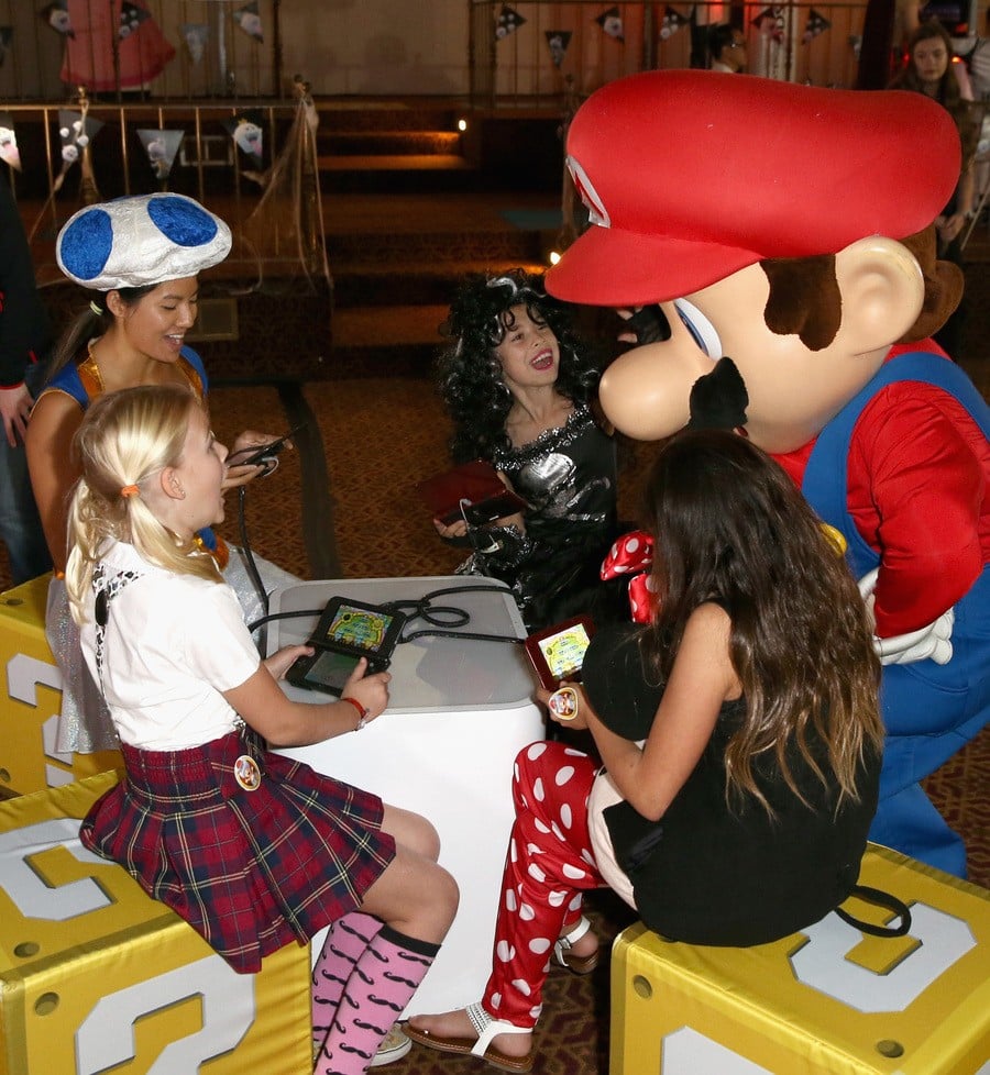 In this photo provided by Nintendo of America, guests of Starlight Children’s Foundation’s “Dream Halloween” event on Oct. 22 in Los Angeles got to meet Mario – one of the stars of the Mario Party Star Rush game.