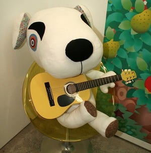 A stuffed K.K playing his guitar