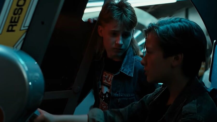 In the movie Terminator 2: Judgment Day, what arcade game is young John Connor playing when the T-1000 spots him in the Galleria mall?