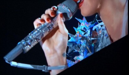 Katy Perry Accessorizes With A Wii Remote Strap During Super Bowl Half-Time Show