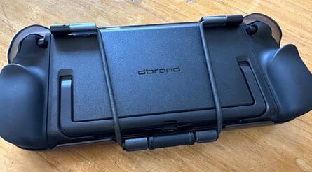 The back of the Killswitch, with the braided elastic anchor that holds the cover in place (left image). It's not a struggle to pull it into place. It's just right. The kickstand (right image) is fully functional with zero compromises with the Killswitch case installed
