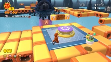 (Clockwise from top left) Ground pound the button and the course appears by magic, with the Cat Shine hidden behind a wall at the end. Navigate the platforms carefully, and use the Fire Flower power-up to take out the enemy and detonate a ball