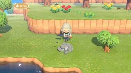 Smashing rocks for additional iron nuggets in Animal Crossing: New Horizons