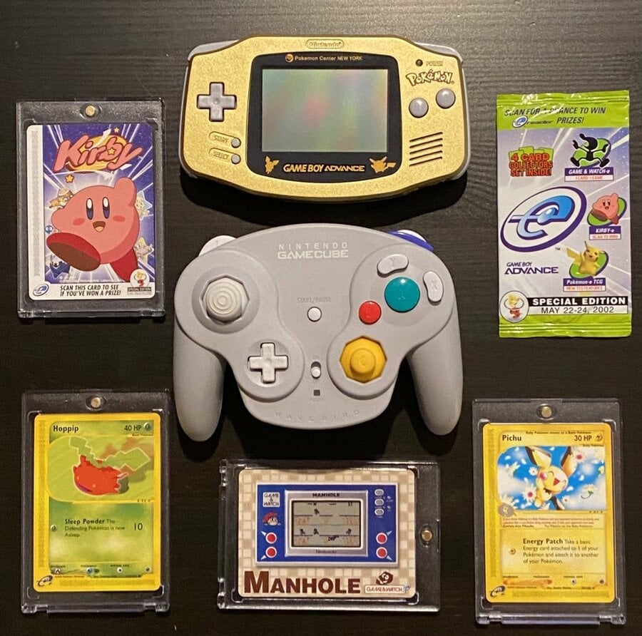 Kirby's card (top left) and others found by Rob, as well as first and second place prizes. E3 2002 participants had a chance to win.