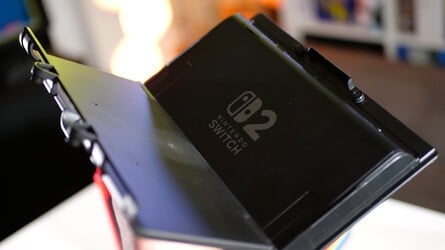 It comes with two carts, one for the Switch and one for the Switch 2. It's easy to insert the console and the cart also drops into the headunit with little effort.