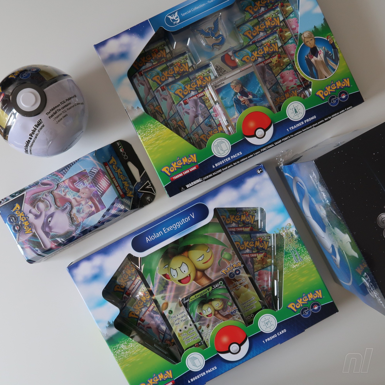 Pokemon GO TCG Trading Card Game: Alolan Exeggutor V Box - 4 booster packs  + promos! 