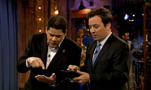 Reggie explains how to tap a touch screen