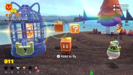 (Clockwise from top left) Use the Propellor boxes to reach the lighthouse with ease. Once at the top, you'll have to give up the Propellor box to hold the key, but as long as you have the Tanooki suit, you can simply float down to the cage from the lighthouse