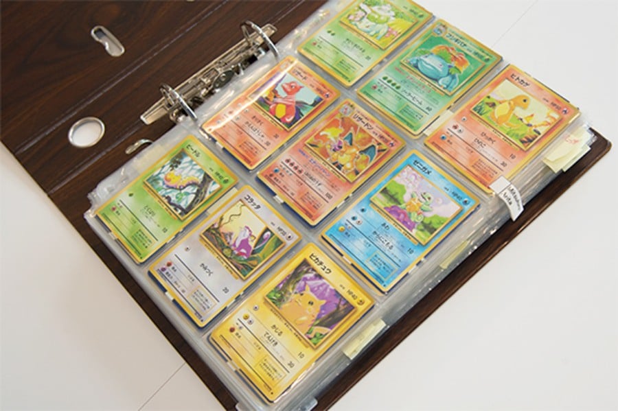 Arita's binder of Pokémon cards featuring every one of his 537 designs